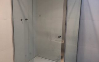 replace shower doors with frameless